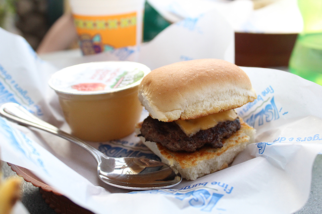 Kids have more options with Islands' kids menu. This is the li'l slider with cheese and an applesauce. 