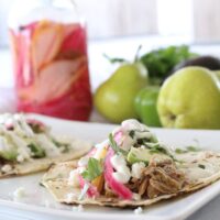 Pickled Pear Carnitas Taco With Jalapeno Crema