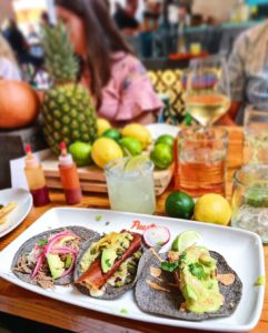 The Pickled Pear Carnitas Taco with Jalapeño Crema at Puesto