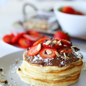 Fluffy Strawberry And Nutella Pancakes strawberry chocolate pancakes