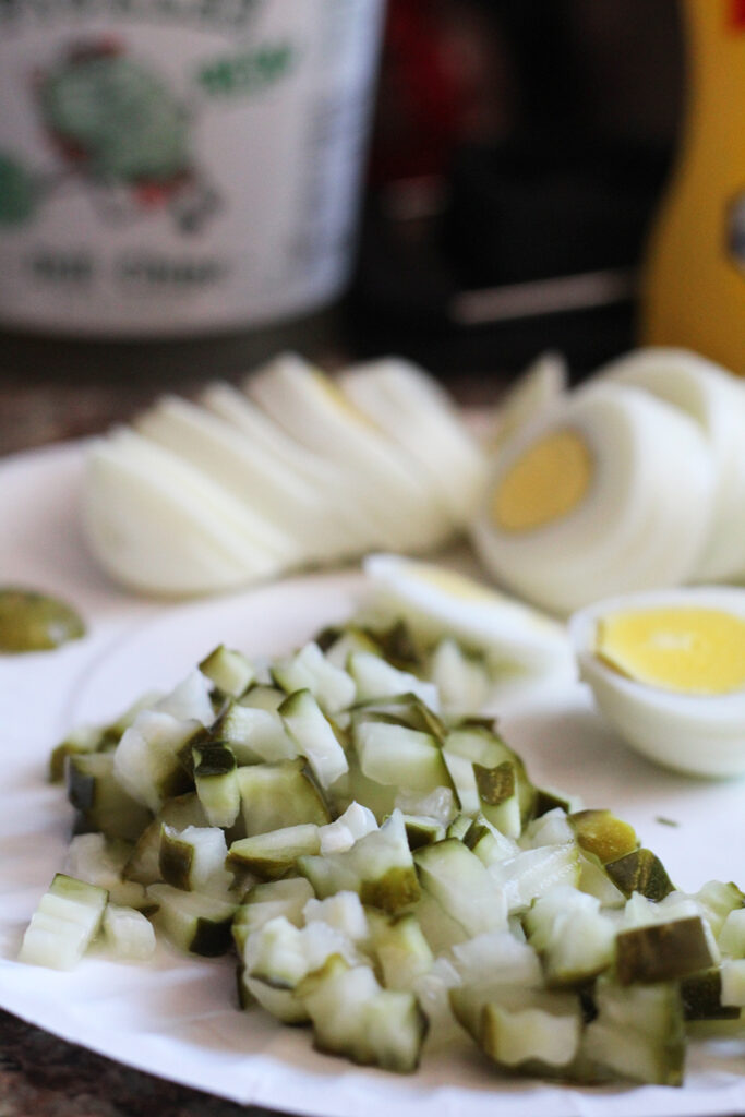 chopped pickles in potato salad