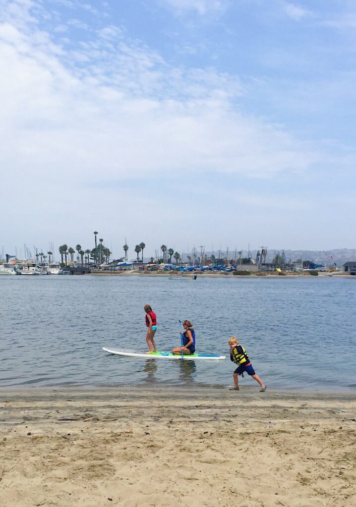 Kids Paddleboarding in Mission Beach