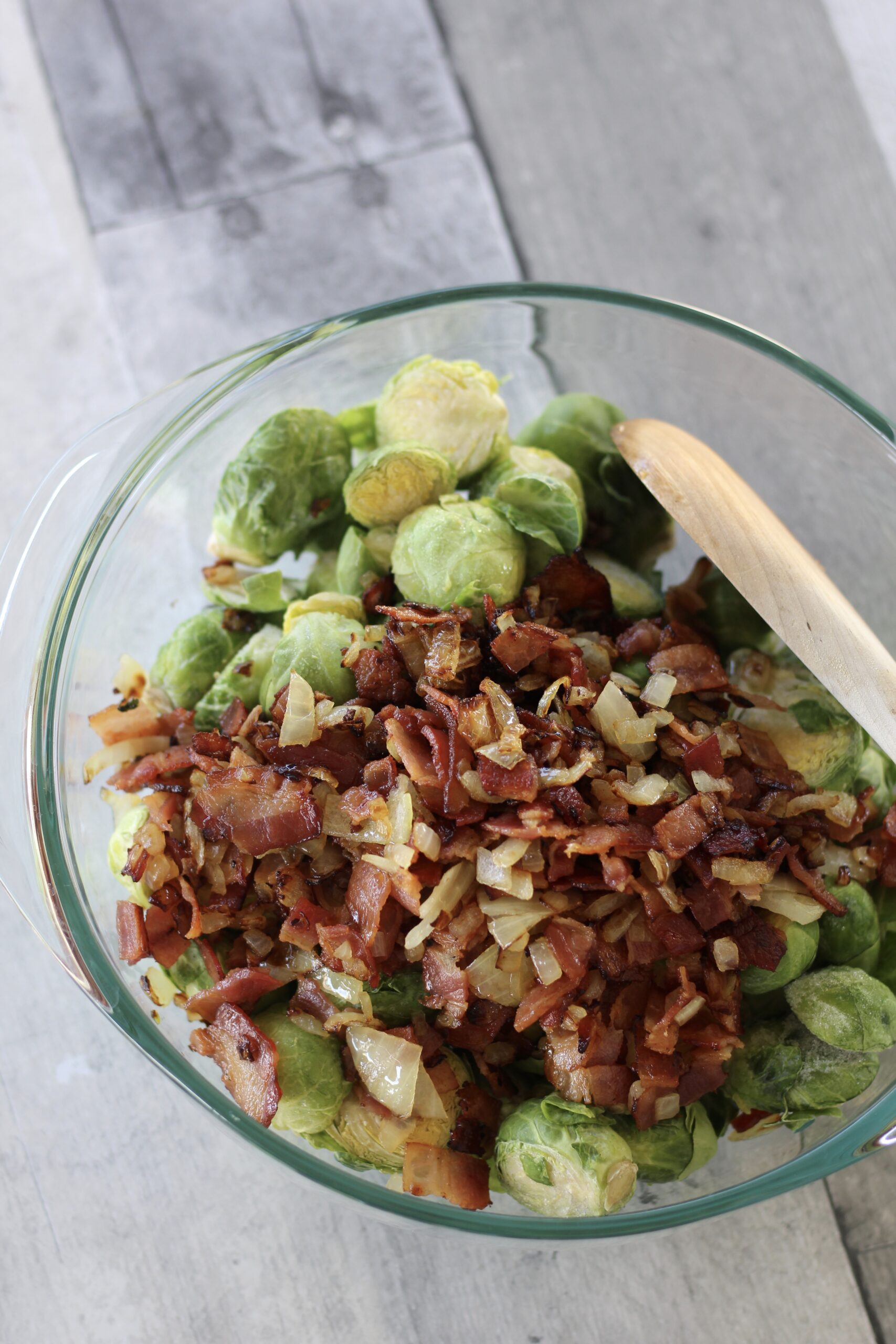 Mix the bacon into the brussel sprouts