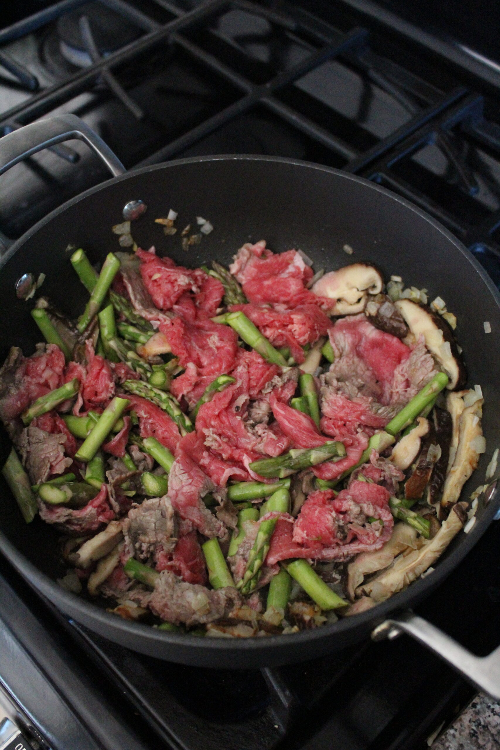 add beef and asparagus